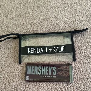 Kendall & Kylie Transparent Pouch with Black Trim and a hersheys pouch